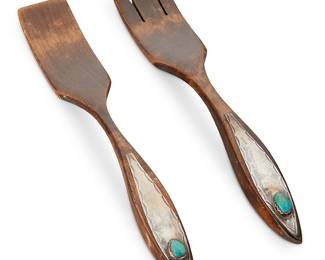 330
Two Turquoise And Silver-Mounted Wood Serving Utensils
20th century
Each unmarked
The rustic carved wood serving pieces, each with mounted chased silver and inset turquoise to handle
2 pieces
Each: 11.5" L
Estimate: $200 - $400