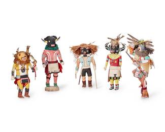 320
Five Hopi Katsina Figures
Late 20th/early 21st century
Each unmarked
The polychrome carved cottonwood figures mounted with feathers, yarn, and hide, comprising two black ogres, one owl with bow and arrow, one wolf with rattle and whip, and a mocking katsina figure
5 pieces
Tallest: 11.5" H x 4.5" W x 3.5" D; Shortest: 9.5" H x 4.5" W x 3.5" D
Estimate: $300 - $500
