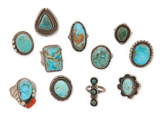 456
A Group Of Southwest Silver And Stone Set Rings
Mid-20th century
Two marked for artist: JT and PR
A large group of silver and set turquoise rings in various styles and sizes including a chunky set coral and turquoise ring, and a triangular shadowbox set turquoise ring, 11 pieces
Largest: ring size 11; smallest: ring size 5.5
100.2 grams gross
Estimate: $500 - $700