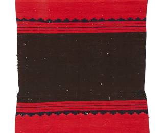 197
A Navajo Late Classic Dress Half
Late 19th century, Diné
Woven with indigo stepped bands and diamonds on a red background and a black center field
49.75" H x 35" W
Estimate: $800 - $1,200