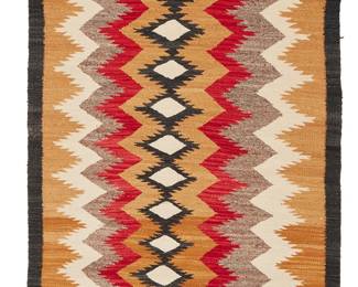 207
A Navajo Regional Rug
Mid-20th century, Diné
Woven in red, cream, grey, tan, and black wool, with a central column of serrated diamonds
35.25" H x 60.75" W
Estimate: $400 - $600