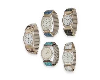 449
A Group Of Southwest Silver And Stone Inlay Wristwatches
Mid/late 20th century
Four variously stamped: Sterling / SP / Francisco / [unknown maker]
Five stone inlay and silver watch bands in various stones including turquoise, onyx, lapis, white stone, and opal, each band plate with motifs to edges, and each with quartz watches, 5 pieces
Each plate: largest: 1.125" H x 1.625" W; smallest: 1" H x 1.5" W
283.8 grams gross
Estimate: $200 - $400