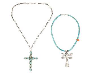 472
A Group Of Southwest Silver And Turquoise Jewelry
Mid/late 20th century
Two works:

Wilson Begay (b. 20th century, Diné)
A Navajo silver, turquoise and coral pendant necklace
Stamped: WB [hat cipher]
A single strand bead necklace finished with a double bar silver cross/dragonfly pendant and asymmetrical coral accent
18.25" L x 2.75" H

A Southwest silver and turquoise cross pendant
Unmarked
With cluster set turquoise, suspended from a delicate stamped paperclip chain
24" L x 3.5" H

2 pieces
76.1 grams gross
Estimate: $300 - $500