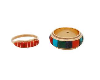 334
Two Southwest Cobblestone Inlay 14K Gold Rings
Late 20th/21st century
Two works:

Delphine Tsadiasi (b. 20th century, Zuni)
A 14K gold and coral inlay ring
Etched: Tsadiasi; stamped: 14K
A diminutive ring with a tapered row of raised coral inlay
Ring size: 8

A Saunsa Navajo 14K gold and stone inlay ring
Etched: Saunsa [workshop name]; stamped: 14K
A chunky gold ring with multistone cobblestone inlay including turquoise, coral, and malachite
Ring size: 7.75

2 pieces
11.6 grams gross
Estimate: $800 - $1,200