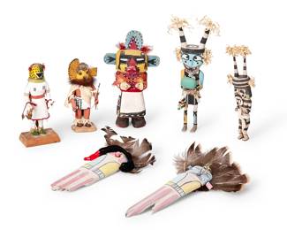 322
A Group Of Hopi Katsina Figures
Late 20th/early 21st century, Hopi-Tewa
One wood shard signed and dated: B. Mahle / 1st Mesa Village / '06' / Hopi Land U.S.A.; another shard signed: E. Mahle; cottonwood marked: Hopi War God
The polychrome wood dolls comprising two corn maidens constructed from wood shards and mounted with feather and yarn, a carved cottonwood War God figure with mounted feathers, two koshare clowns, one owl katsina depicted with bow and arrow, and another katsina depicted holding a gourd flask and a whip
7 pieces
Largest: 10" H x 5.5" W x 3" D; Smallest: 7.625" H x 3.25" W x 3.125" D
Estimate: $300 - $500