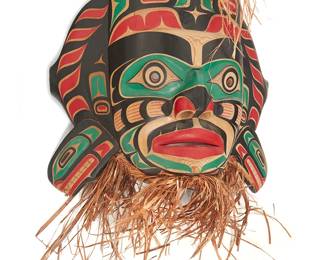151
Randy Stiglitz
b. 1956, Coast Salish/Cree
Northwest Coast Mask
Painted carved wood and cedar bark
Signed verso: R. Stiglitz
Overall: 28" H x 33" W x 10.5" D; Wood: 20" H
Estimate: $1,000 - $1,500