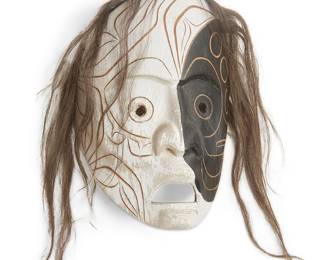 175
Stephen Charlie
b. 1959, Coast Salish
"Moon Mask"
Painted carved wood and horsehair
Signed and titled verso: Stephen Charlie
Overall: 13.5" H x 8.5" W x 4.5" D; Wood: 8.75" H x 6.25" W x 4.5" D
Estimate: $200 - $400