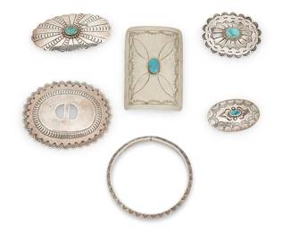 474
A Group Of Southwest Silver Jewelry
Mid-20th century
Each unmarked
Six works comprising a ketoh/bow guard plaque with set turquoise, a stamped triangular wire bangle bracelet, a single First-Phase-style concho, and three set turquoise oval concho style brooches in various sizes, 6 pieces
Ketoh: 3.125" H x 2.125" W; bangle: 7.5" Dia.; concho: 2.5" H x 3" W; brooches: 2.75" W, 2" W, 1.75" W
137.3 grams gross
Estimate: $300 - $500