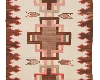 204
A Navajo Regional Rug
Early 20th century, Diné
Woven in red, cream, light brown, and dark brown wool, with a central cross, stepped half diamonds, and an elaborate border
63" H x 36.25" W
Estimate: $500 - $700