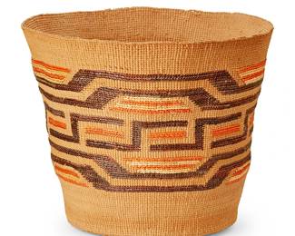 144
A Tlingit Polychrome Basket
Late 19th/ early 20th century; Pacific Northwest Coast
The twined flared cylindrical basket with imbricated orange, brown, and yellow banded geometric motifs
6.375" H x 8" Dia.
Estimate: $800 - $1,200