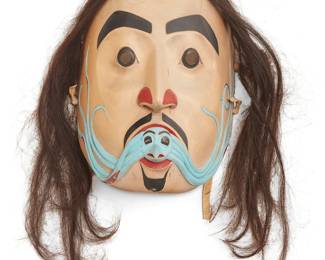 164
Glen Rabena
b. 1953, Adopted Haida
Northwest Coast Mask, 1977
Painted carved wood and horsehair
Signed and dated verso: Rabena
Overall: 15" H x 14" W x 4.875" D; Wood: 9.25" H x 7" W x 4.875" D
Estimate: $700 - $900