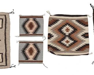 232
A Group Of Navajo Two Grey Hills Matts And Throws
Mid/late 20th century, Diné
One with paper tag: Weaver: Marie P. Howard / of Fruitland (CPA); another with paper tag: Weaver: Dorene Yazzie (XEL)
Each woven in variations of browns, black, grey, and cream wool, comprising a Marie P. Howard mat with elongated diamond motif (14.5" H x 23.5" W), a Dorene Yazzie mat with double serrated diamond motif (17" H x 18.75" W), a mat with stepped diamond on grey ground (17.25" H x 24.5" W), and a pair of small mats with central serrated diamond motifs (each: 9.5" H x 10.25" W)
5 pieces
Estimate: $300 - $500