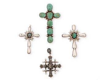 466
Four Southwest-Style Silver And Turquoise Cross Pendants
Mid/late 20th century
Silver pendant stamped: Sterling / Mexico / [Eagle 3] / Taxco / 925 / V [within circle]
Comprising a large silver and turquoise cluster-set pendant cross, two sandcast silver and set turquoise pendant crosses, and an elaborate Mexican sterling silver openwork overlay cross pendant, 4 pieces
Largest: 3.5" H x 1.875" W; smallest: 2.5" H x 1.875" W
72.3 grams gross
Estimate: $300 - $500