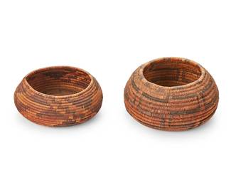 132
Two Diminutive Pomo Baskets
Early 20th century, California
The coiled basketry polychrome bowls, comprising one with hooked arm motif and the other with banded stepped motif
2 pieces
Larger: 2.125" H x 4" Dia.; Smaller: 1.5" H x 3.875" Dia.
Estimate: $500 - $700