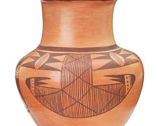 421
Irene Shupla (B. 20th Century, Hopi-Tewa)
A yellowware pottery vase, mid-20th century
Signed to underside: Irene Shupla
The vase with flared rim above brown slip-painted kiva step, whirlwind, and eagle feather motifs
8.5" H x 7" Dia.
Estimate: $100 - $200
