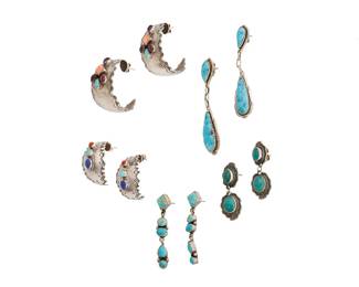462
A Group Of Southwest-Style Sterling Silver Earrings
Late 20th century
Each stamped for sterling; three further stamped for artist
Five pairs of sterling silver and stone set earrings including two pairs of wide stamped silver crescent earrings with cluster set stones, as well as a pair of Alvina Quam Zuni tapered turquoise drops, a pair of Al Somers (b. 1942, Apache/Blackfoot) stacked green turquoise dangles, and a pair of LG narrow turquoise drops, 10 pieces
Largest: 2.5" H; smallest: 1.5" H
63.0 grams gross
Estimate: $200 - $400