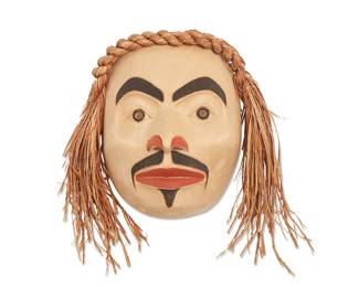 165
A Northwest Coast Polychrome Mask
Late 20th century
Unsigned
The mask with applied braided cedar bark hair and painted red and black facial features
Overall: 10.5" H x 11" W x 5" D; Wood: 8" H x 6.25" W x 5" D
Estimate: $200 - $400