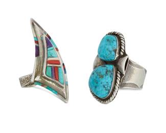 450
Two Southwest Silver Stone Set Rings
Late 20th century
Each stamped for artist; one stamped for sterling
Comprising a David Tune (b. 1955, Creek/Navajo) cobblestone inlay ring with an asymmetrical cast sterling silver band (size: 7.5), and a JM silver and double set chunky turquoise ring (size: 9.5), 2 pieces
42.5 grams gross
Estimate: $200 - $400
