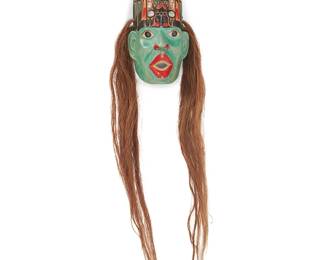 153
Randy Stiglitz
b. 1956, Coast Salish/Cree
Northwest Coast Mask, 2003
Painted carved wood, abalone shell, and horse hair
Signed and dated verso: Randy Stiglitz / 01/03
Overall: 41" H x 11" W x 5.5" D; Wood: 14.25" H x 7.75" W x 5.5" D
Estimate: $800 - $1,200