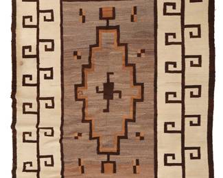213
A Large Navajo Two Gray Hills Rug
Early 20th century, Diné
Woven in cream, dark brown, light brown, and natural grey/brown wool, with stepped diamond motif at center and a hooked motif border
77.5" H x 107" W
Estimate: $800 - $1,200