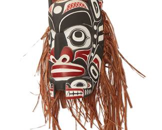 171
A Northwest Coast Polychrome Mask
Late 20th century
Incised signature verso: G. Morrison
The carved wood mask painted black, red, and white, with cedar bark hair
Overall: 22" H x 13" W x 6.5" D; Wood: 14" H x 6.5" W x 6.5" D
Estimate: $400 - $600
