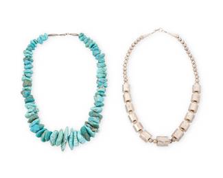 363
Two Southwest Necklaces
Mid/late 20th century
Barrel bead stamped: LAR
Comprising a silver bead and stamped barrel bead necklace, as well as a chunky graduated turquoise nugget necklace, 2 pieces
Each: 24" L
319.2 grams gross
Estimate: $200 - $400