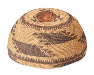 116
A Hupa/Yurok/Karuk Polychrome Basketry Hat
Early 20th century; Northern California
The twined hat with imbricated banded brown and orange bands and geometric motifs
3.25" H x 6.25" Dia.
Estimate: $500 - $700