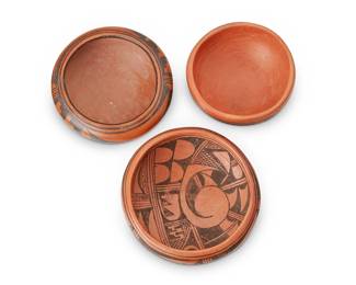 424
Three Hopi Pottery Bowls
20th century
Each unsigned
Comprising three black on red bowls featuring banded geometric feather and kiva step motifs, the larger vessel featuring interior design
3 pieces
Largest: 2.375" H x 6.75" Dia.; Smallest: 2.5" H x 5.625" Dia.
Estimate: $400 - $600