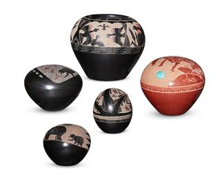 327
Gloria Goldenrod Garcia (B. 1942, Santa Clara Pueblo)
Five diminutive sgraffito pottery items, late 20th/early 21st century
Each with incised signature to underside: Goldenrod
Comprising a blackware jar with avian and banded storm pattern motifs to shoulder, a blackware vessel depicting bears and butterflies within a bear track mark, a blackware vessel depicting two bears and a Hopi tawa sun face, a blackware vessel depicting butterflies with Polik-mana butterfly maiden figures and inset coral, and a redware vessel depicting a bucking horse and sprinting hare featuring inset turquoise
5 pieces
Jar: 3" H x 3.5" Dia.; Smallest: 1.875" H x 1.75" Dia.
Estimate: $800 - $1,200