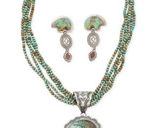 342
A Group Of Southwest Sterling Silver And Carved Turquoise Fetish Jewelry
Late 20th century
Each stamped for sterling ; Pendant further stamped: VJP; earrings illegibly marked [likely Coriz]
Comprising a multi-strand rolled turquoise and heishi necklace suspending a removable large Vincent J Platero (b. 1957, Diné) Navajo turquoise bear fetish pendant/brooch with an elaborate stamped silver bezel and bail, together with a pair of similarly designed silver and carved turquoise bear fetish dangle earrings with set sugilite, 4 pieces
Necklace: 21.5 " L; pendant: 3" H x 2.125" W; each earring: 2.75" H
104.0 grams gross
Estimate: $600 - $800