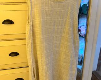 Closet of name brand clothing sizes medium to large