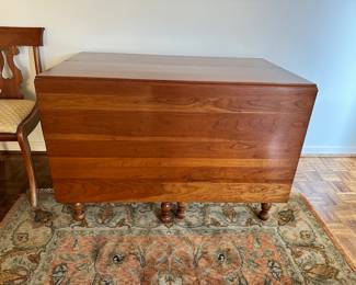 Drop leaf dining room table with additional leaves