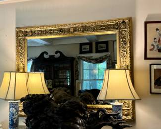 Carved gilt mirror    44"h x 54"w 