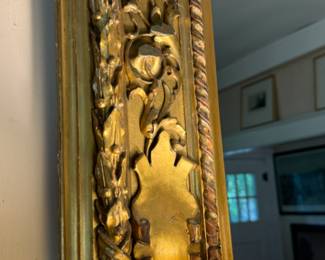 Carved gilt mirror    44"h x 54"w 