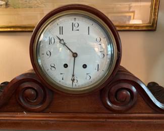 Carved mahogany tambour clock                                              27" long x 14.5"h x 7.5"d