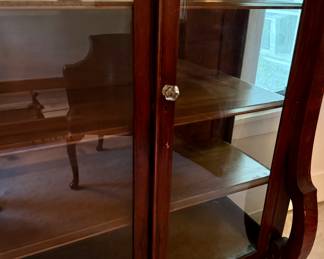 American empire glass door cabinet