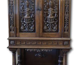 Spartan Carved Walnut Cabinet 