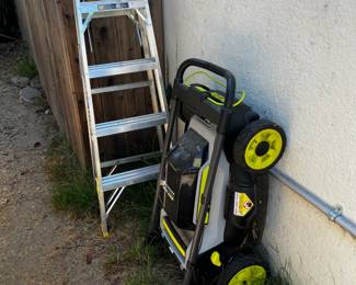 Ryobi battery powered lawn mower and small step ladder for sale. 