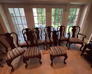 Set of eight carved ball and claw foot chairs