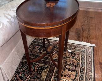 Pair of oval and inlaid antique tables