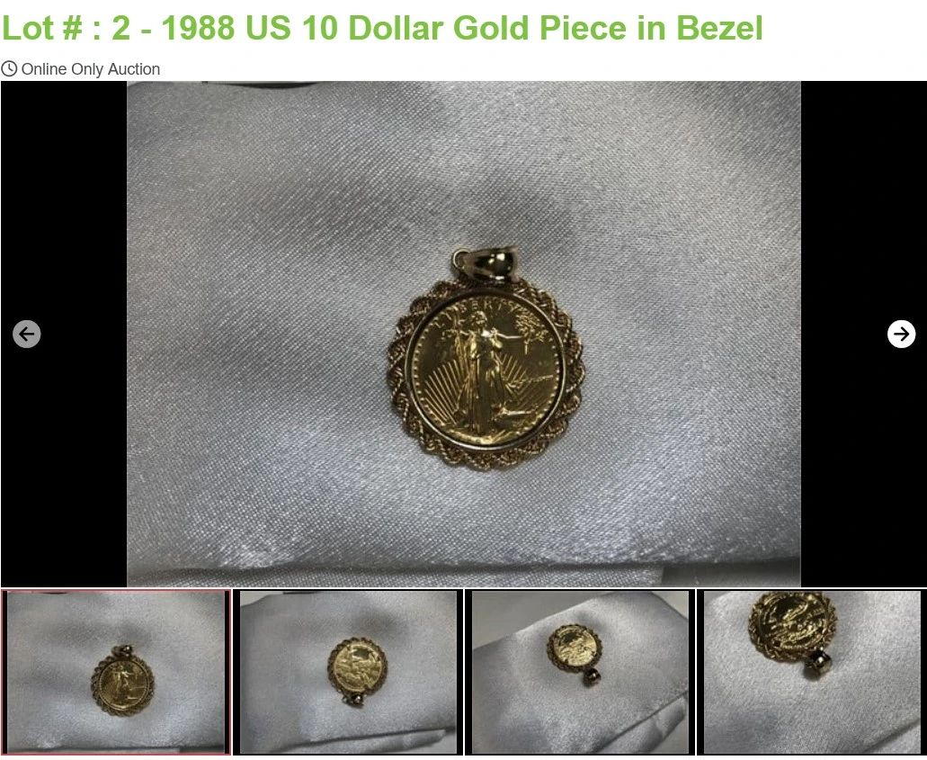 Lot # : 2 - 1988 US 10 Dollar Gold Piece in Bezel
1" round bezel 14K yellow gold bezel with 1/4 oz 10 dollar US Gold Piece total weight is 12.0 grams.
