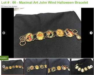 Lot # : 66 - Maximal Art John Wind Halloween Bracelet
Bracelet is 8" long 1 3/8" wide with toggle clasp and safety chain. Bracelet has silhouettes of a Cat, Witch, Raven and Jack-O-Lantern.
