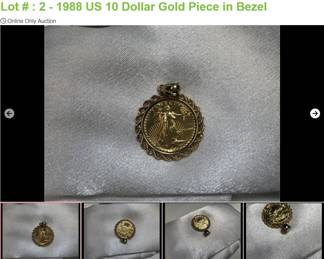 Lot # : 2 - 1988 US 10 Dollar Gold Piece in Bezel
1" round bezel 14K yellow gold bezel with 1/4 oz 10 dollar US Gold Piece total weight is 12.0 grams.
