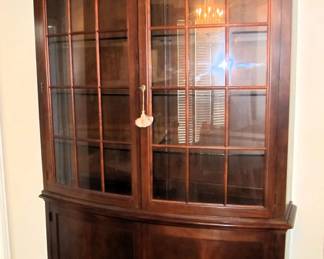 Stunning 2 piece lighted bow front hutch