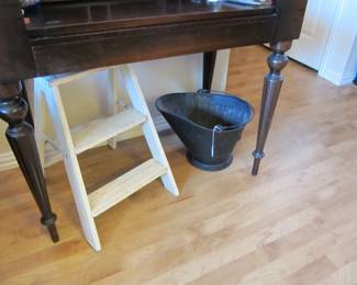 A great "shabby chic" step ladder, just add something cute and you're done.  Also, an antique coal bucket.