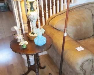 Antique pair of mahogany "pie crust" end tables in excellent shape. they are accented with a beautiful blue Fenton vase. A pair of vintage floral lamps, Also a 1900s Bissell floor roller/cleaner