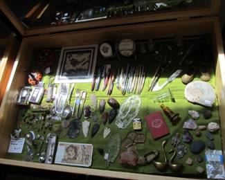 Plenty of unique and collectible items. Arrow heads, antique pens, baseballs, vintage Halloween, and more!