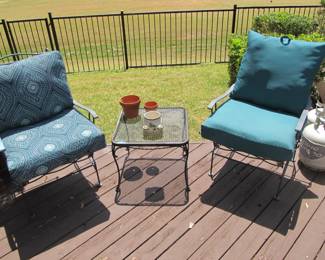 Wrought iron rocking chairs