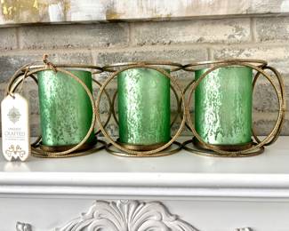 Candleholders in gold container