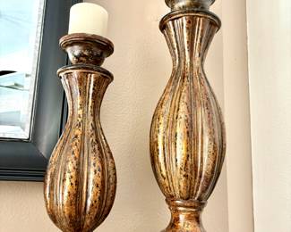 Pair of tall candlesticks